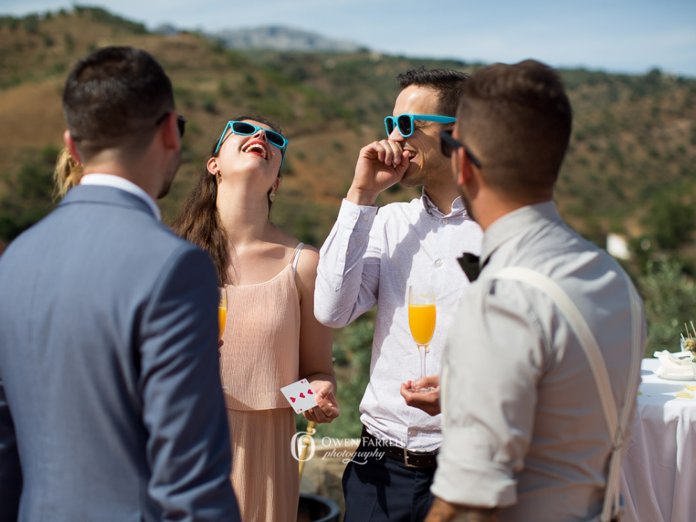 Guests enjoying a wedding drinks reception in Spain
